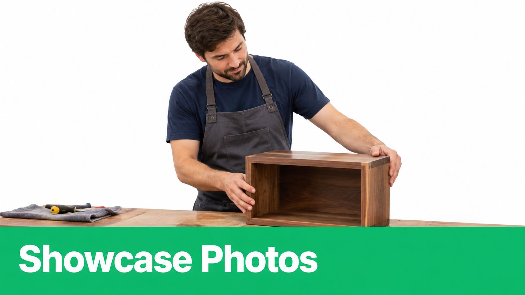 A professional carpenter inspects a custom-made wooden storage box on his workshop table.